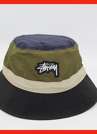 Універсальна панама stussy однотонна біла з вишитим логотипом стуссі прошитими полями олива-беж