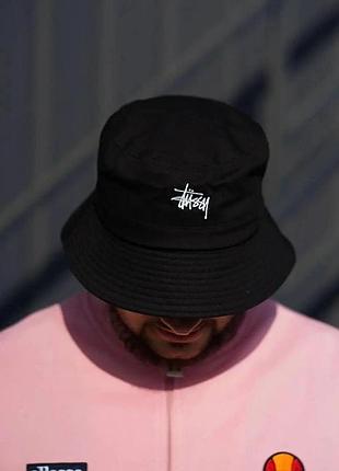 Універсальна панама stussy однотонна біла з вишитим логотипом стуссі прошитими полями чорний