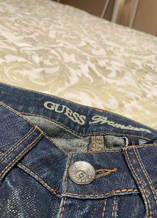 Джинсы guess с разрезами5 фото