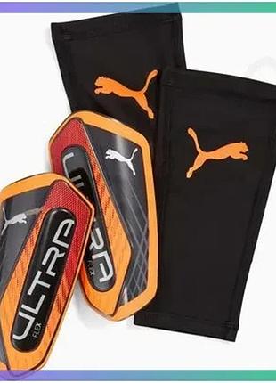 Щитки puma ultra flex sleeve черные оранжевые для футбола для детей рост 115-135 см sku_030987-05
