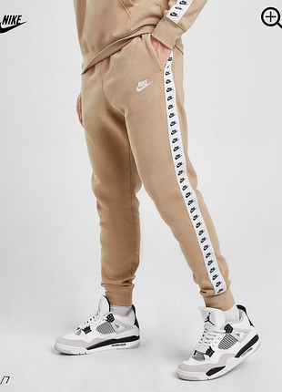 Штани nike з лампасами, size m(може бути також на s), стан ідеальний, півпояс резинка 37-46 бедра 56 довжина 93