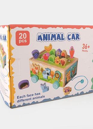 Деревянный развивающий набор-сортер "animal car" включает в себя 20 разноцветных фигурок животных, овощей и фруктов.