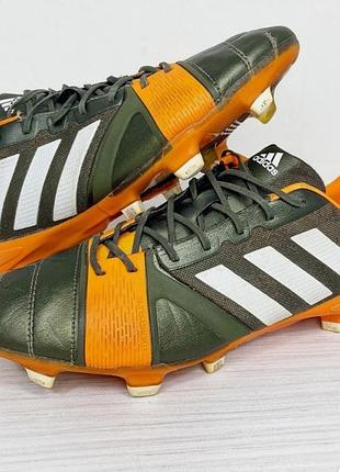 Футбольные бутсы для мальчика на потолку 23.см бренда adidas