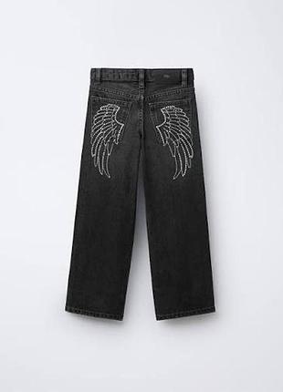 Джинсы с крыльями zara