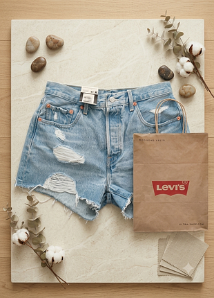 Аьсолютно нові, культові джинсові шорти levi's premium 501 high rise. модель з високою посадкою та ефектним рваним дизайном (distressed).  28 розмір
​