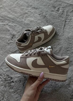 Новенькі  оригінальні nike dunk low malt (38,5)