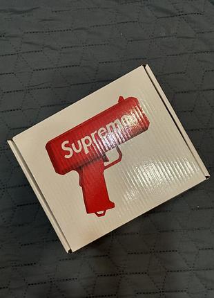 Пістолет для метання грошей supreme money gun