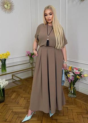 Костюм блуза вільного крою з v-образним вирізом і завʼязками по спині з спідницею-брюками