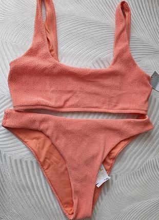 Персиковый в рубчик купальник фирмы primark cares размер l (размер 42/44 европейский)