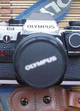 Фотоаппарат olympus om-10 + адаптер+ olympus om zuiko 28mm 2.8 с крышкой и ремнем