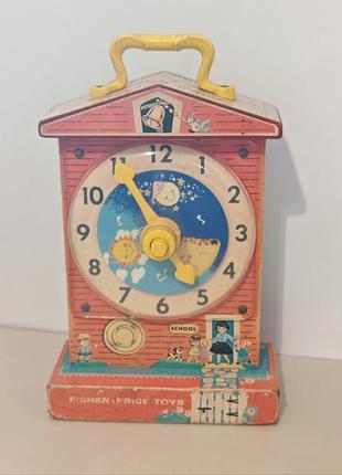 Винтажная музыкальная игрушка-часы fisher-price, выпущенная примерно в 1968 году.игрушка, для обучения детей определению времени