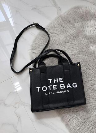 Сумка the tote bag от бренда marc jacobs.