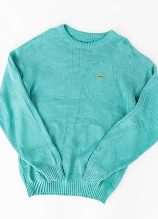 Чоловічий, вінтажний светр lacoste бірюзового кольору. виготовлений із суміші бавовни та акрилу, має м’яку в’язану текстуру та приємний до тіла