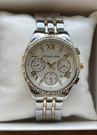 Женские часы на браслете michael kors комбинированного цвета со светлым циферблатом