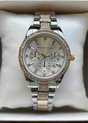 Женские часы на браслете michael kors комбинированного цвета со светлым циферблатом