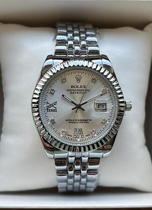 Женские часы на браслете rolex datejust серебристого цвета
