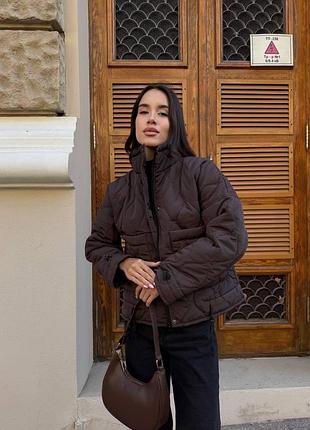 Куртка женская демисезонная на кнопках пошита из непромокаемой, водоотталкивающей стеганой плащівки emmi