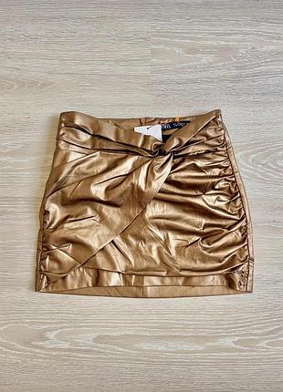 Zara жіноча нові стильна спідниця золотиста.