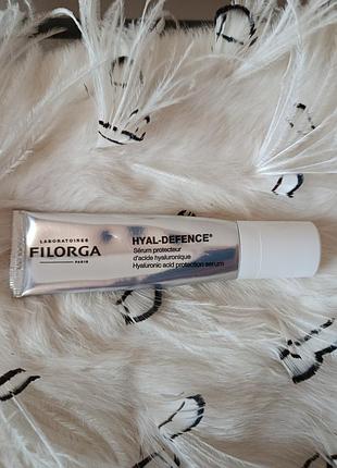 На изображении показана защитная сыворотка с гиалуроновой кислотой filorga hyal-defence hyaluronic acid protection serum
