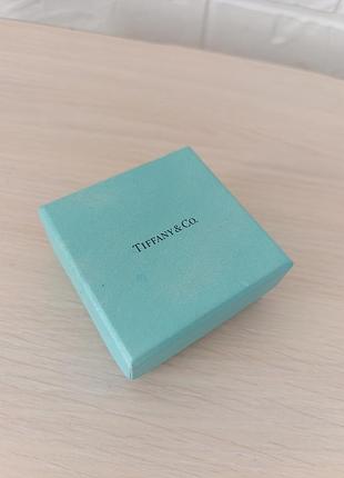 Блакитна картонна маленька коробочка tiffany