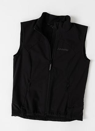 Жіночий жилет schoﬀel чорного кольору з матеріалу софтшел. легка та практична модель із високим коміром, повною застібкою-блискавкою та двома кишенями