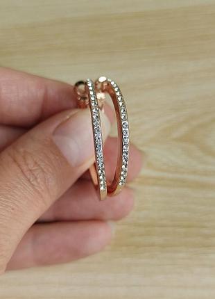 Жіночі круглі сережки (конго) золотистого кольору зі стразами crystal jewerly