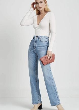 Стильне та універсальне жіноче боді від бренду h&m (лінійка divided).