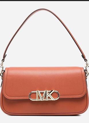 Ця помаранчева оригінальна сумка michael kors parker medium виготовлена з гладкої шкіри та оснащена золотистою фурнітурою.
