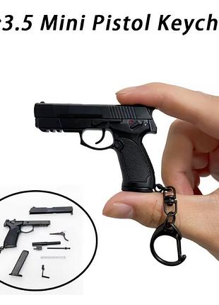 Брелок разборной пистолет keychain pistol черного цвета игрушка из металла и пластика