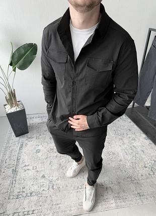 Чорний чоловічий однотонний класичний костюм