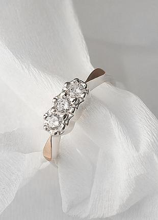 Серебряное кольцо с золотыми вставками трио 20