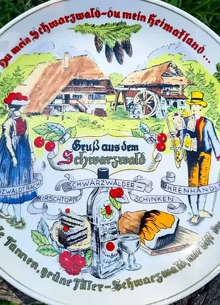 Колекційна німецька тарілка "gruß aus dem schwarzwald", присвячена традиціям і символам