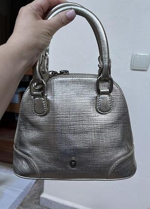Золотиста брендова сумка aigner