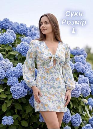 Коротка сукня з квітковим принтом та акцентом на декольте, розмір l