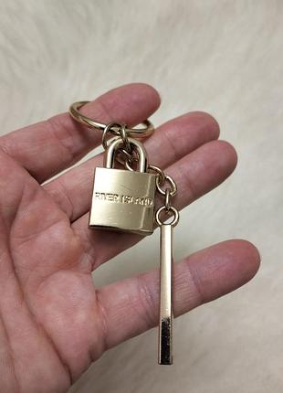 Брелок підвіс на сумку river island