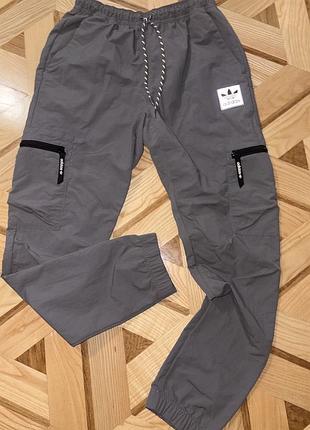Оригінальні штани adidas originals cargo сірі карго плащівка