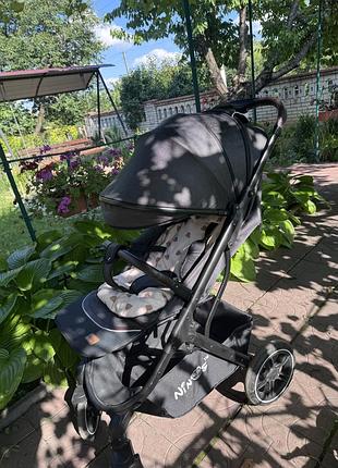 Продам прогулянкову коляску ninos