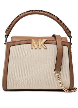 Ця сумка — модель michael michael kors karlie small canvas top-handle crossbody, виконана з натуральної шкіри та полотна.