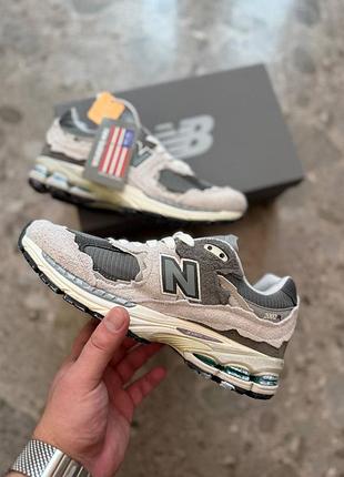 Стильные женские кроссовки new balance 2002r protection pack rain cloud