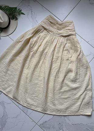 Спідниця міді кольору масло