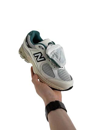 Женские кроссовки new balance 2002r pouch beige green