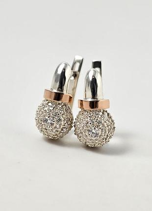 Серьги из серебра и золотое кольцо с фианитами.