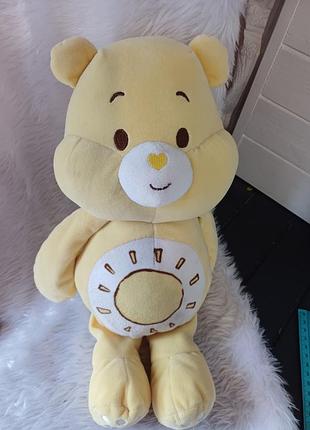 Жовтий весняний ведмідь funshine bear із серії  care bears baby дбайливі ведмедики