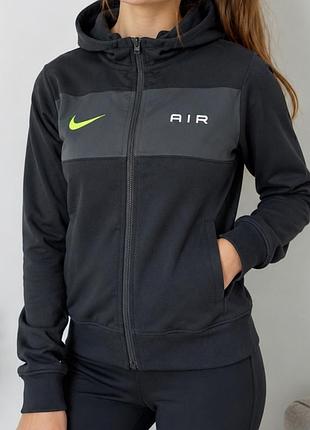 Чорна толстовка на блискавці nike air із сірою вставкою на грудях на зріст 137-147 см.
чорна толстовка з капюшоном nike. олімпійка nike на дівчину