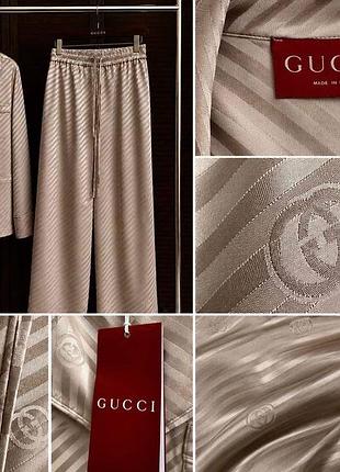 Шовкові костюми у піжімному стилі gucci