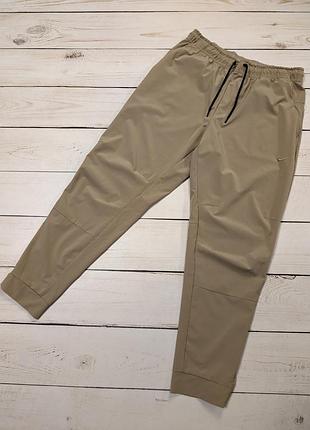 Чоловічі легкі спортивні штани nike unlimited woven pants оригінал бежеві джогери найк