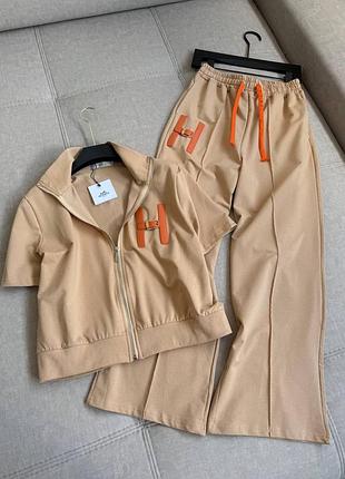 Hermes бежевий костюм штани та кофта на змійці з гарною буквою h