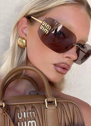 Нереальні окуляри великі miu miu