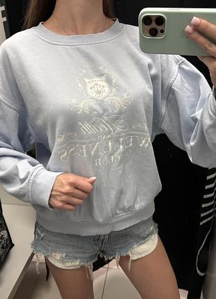 Ніжно-блакитний бавовняний світшот жіночий h&m у стилі бренду sporty and rich.