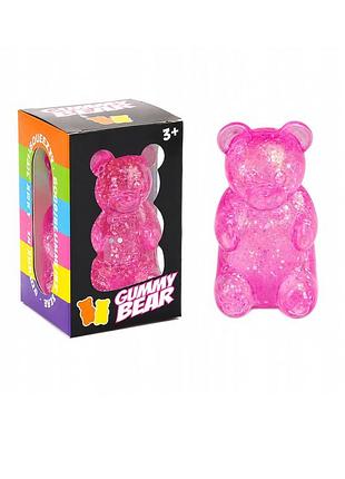 Антистресс мишка с глиттером squishy gummy bear glitter 7×4 см розовый 1 шт
